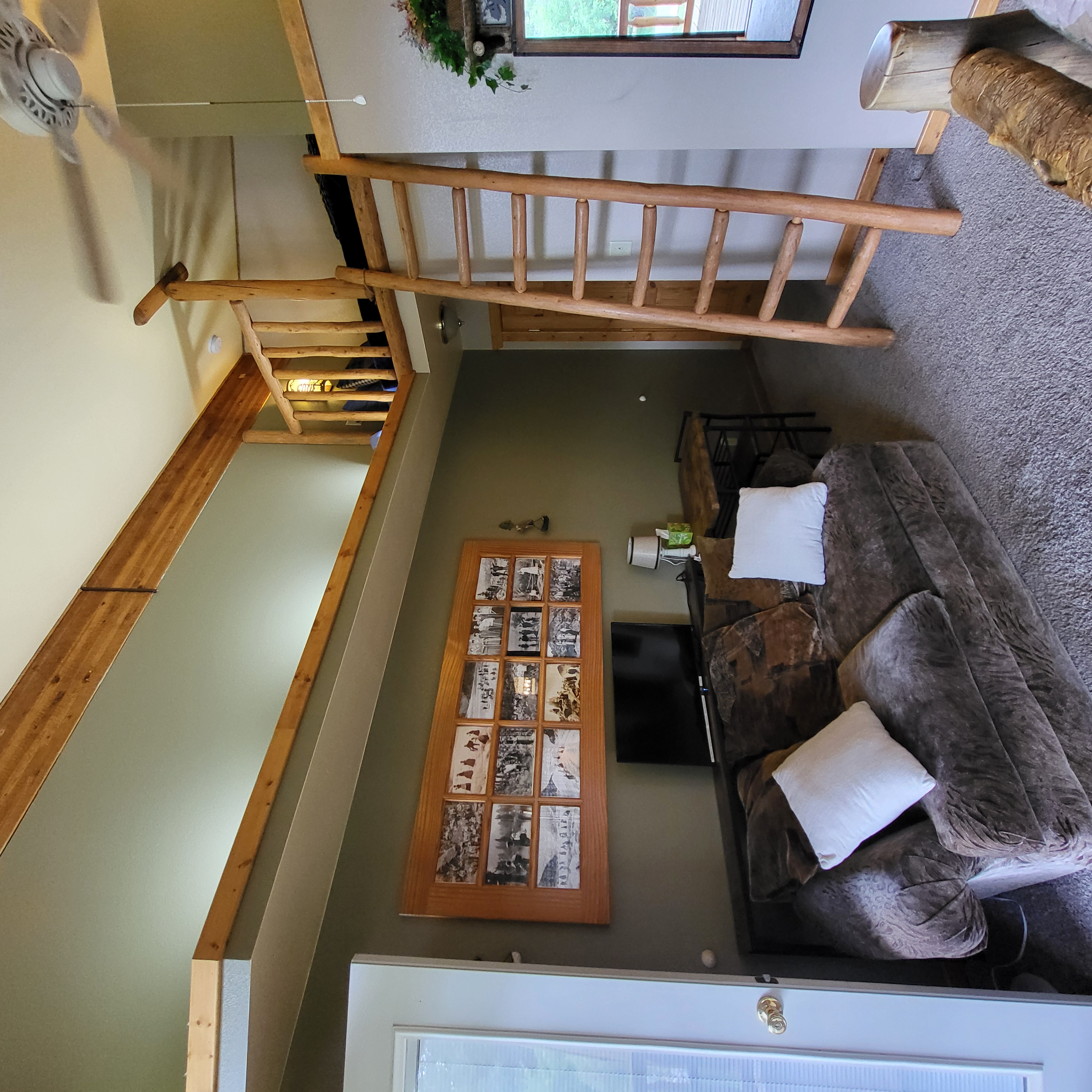 Mt. Columbia Room Sitting Area next to a Laddered Loft Twin Bed