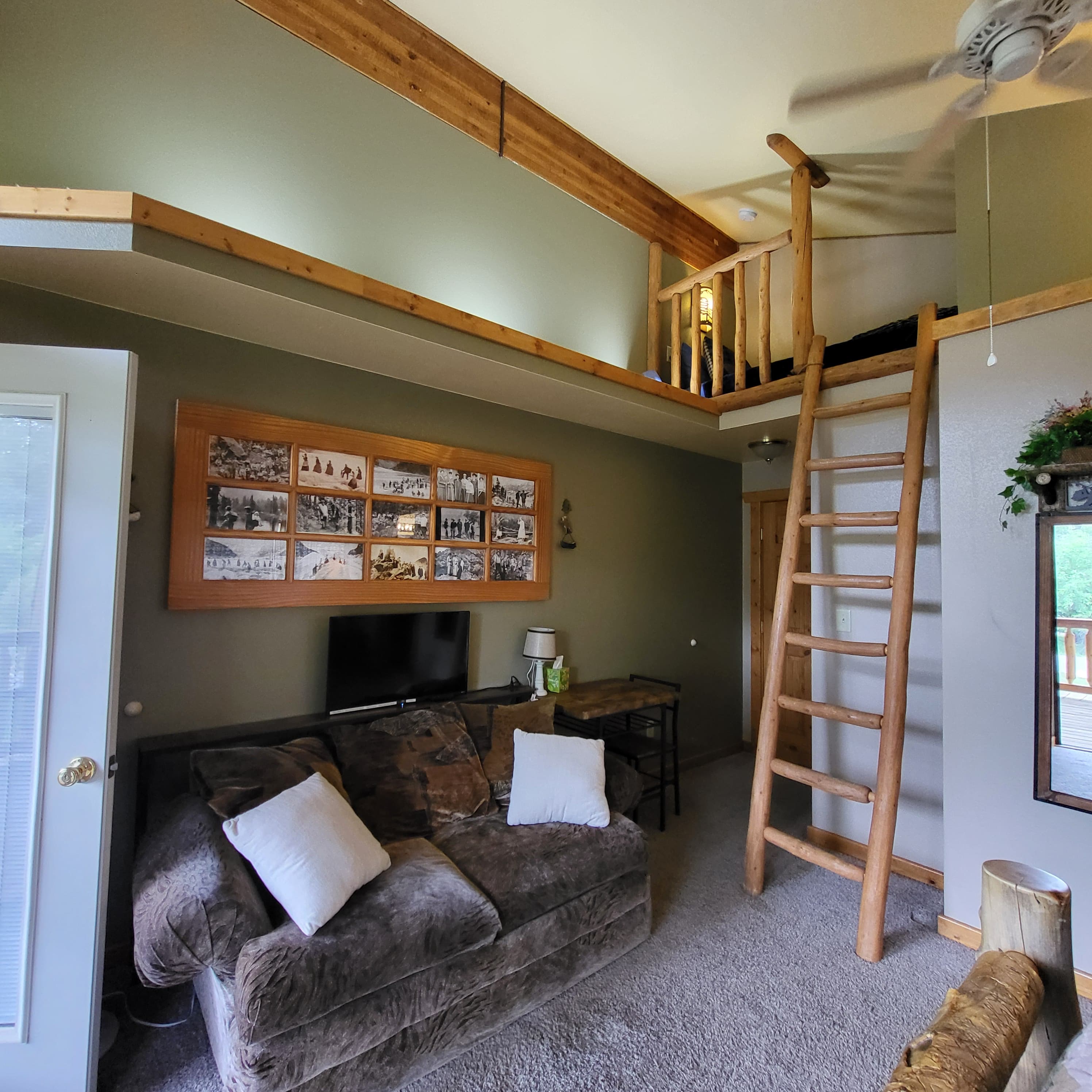 Mt. Columbia Room Sitting Area next to a Laddered Loft Twin Bed